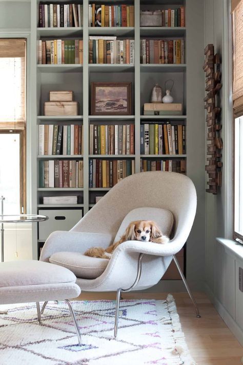 Living room with niches and armchair.