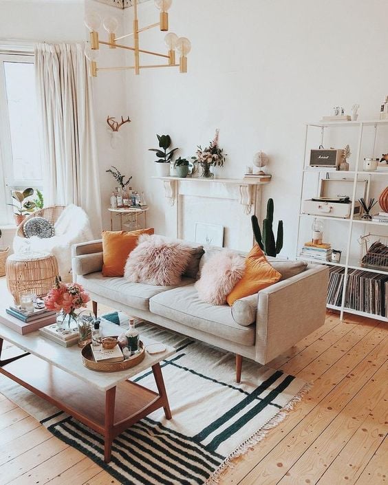 Living room with sofa and pillows.