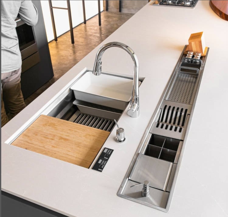 Kitchen sink with stainless steel wet trough.