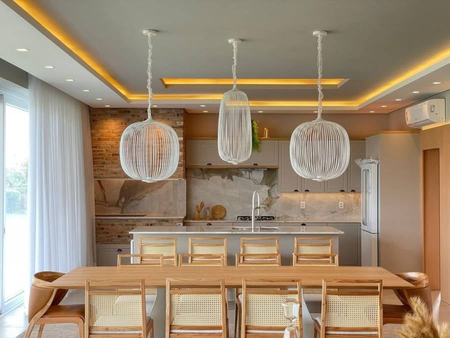 American kitchen with island and glass wall.