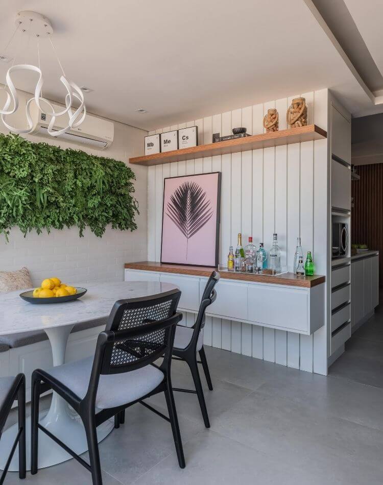 Dining room with vertical garden and air conditioning.