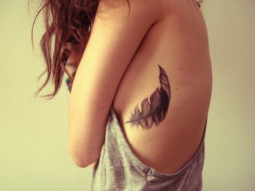 female rib tattoos