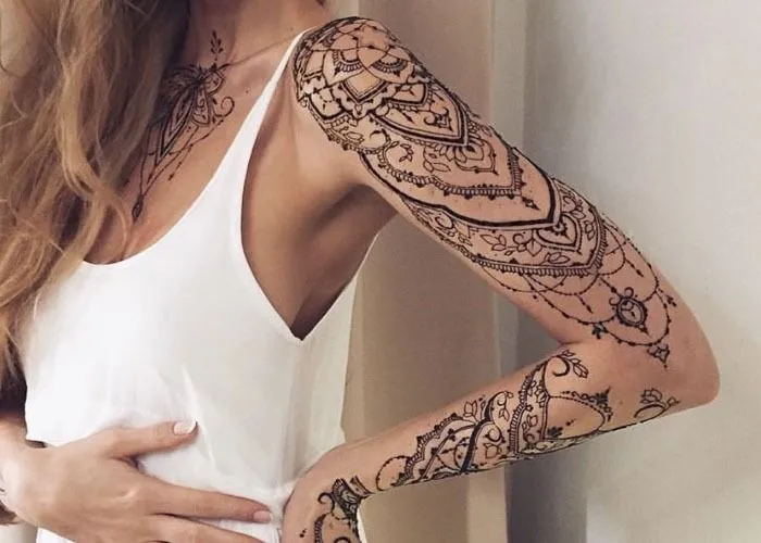 Henna tattoo on arms