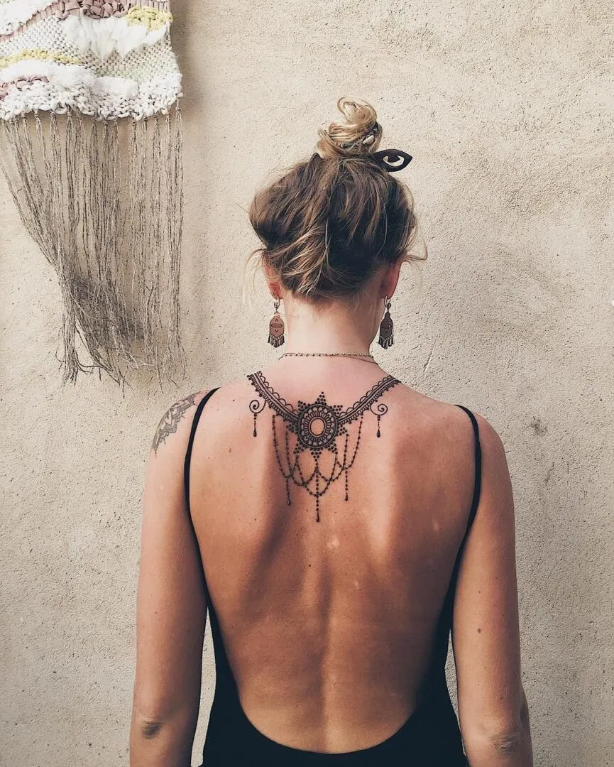 Check out: Henna tattoo on the back - Ancient Art