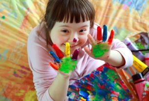 How does a baby with Down syndrome develop?