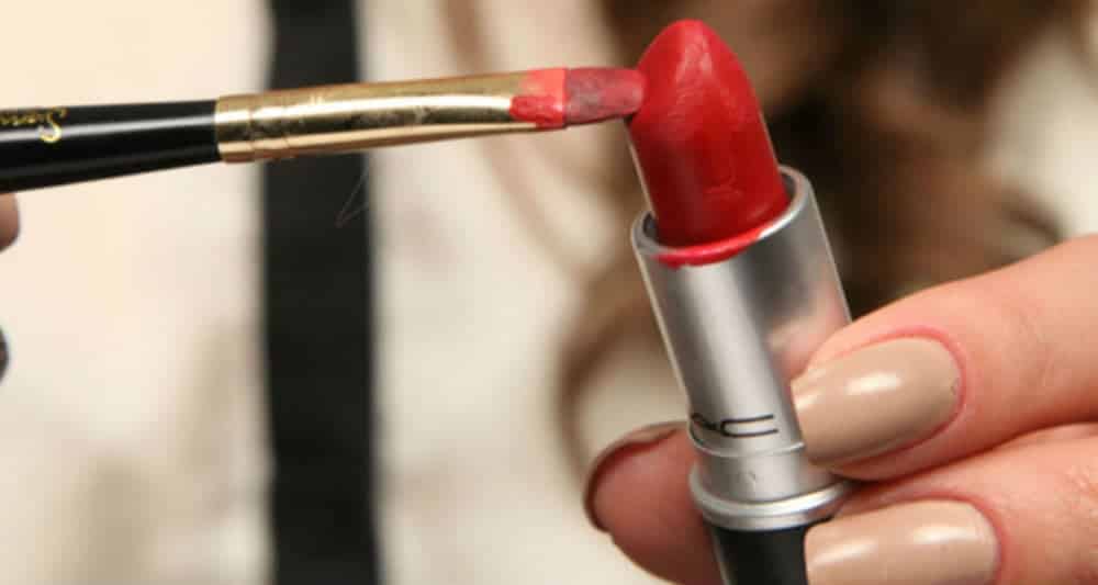 Learn how to hide dark circles with red lipstick