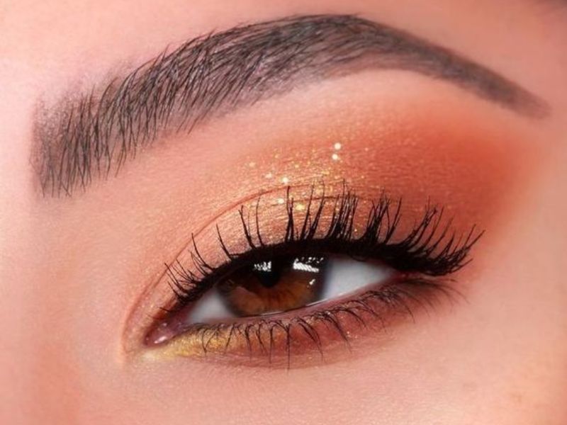 Peach or coral brown eye makeup