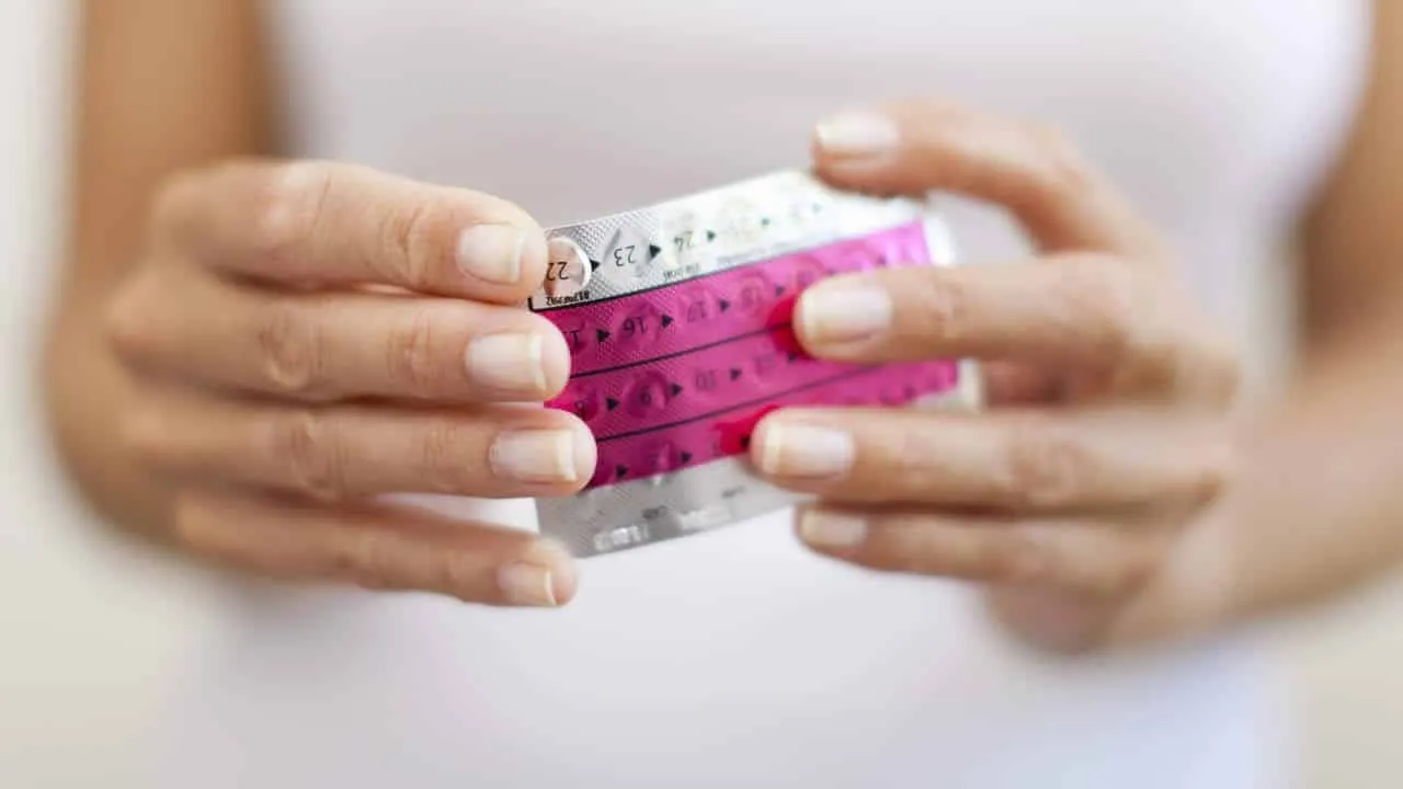 When should a woman start taking contraceptives?