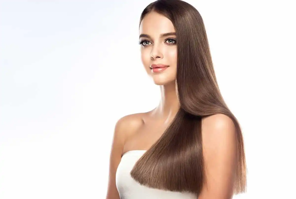 A young woman with hair longer and smooth