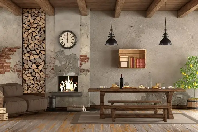 The living room, two rooms with rustic decor, wall, bricks, stone, wood, hardwood floor, table, and bacos for the bare wood finish, and the cement on the wall