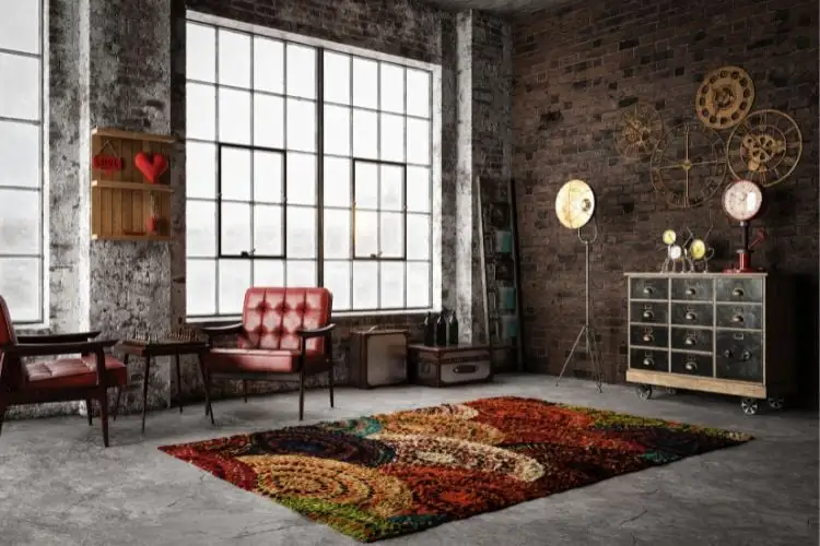 The living room industrial style, with large windows, the brick and the view, decor, industrial, carpet, colored, and red armchairs