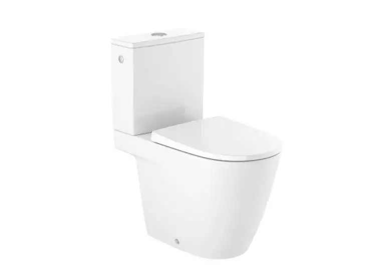 Le siège de toilette blanc avec une boîte attachée.